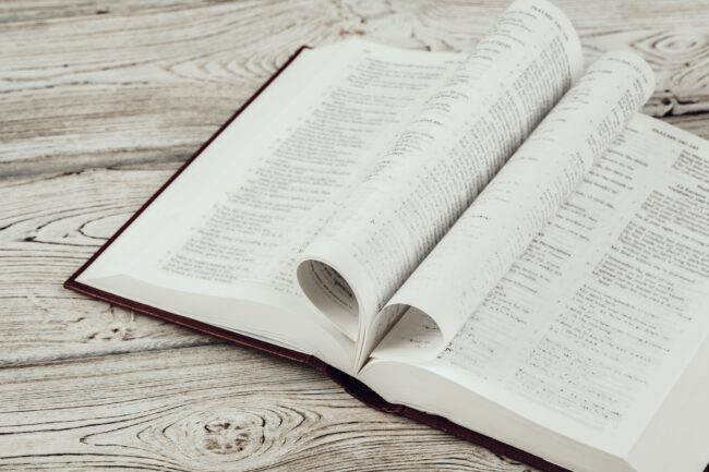 The Holy Bible on a wooden table
