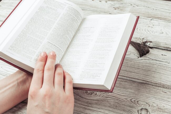 Woman reading the Holy Bible