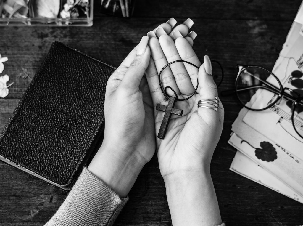 Holding Cross on Hands with Faithfulness